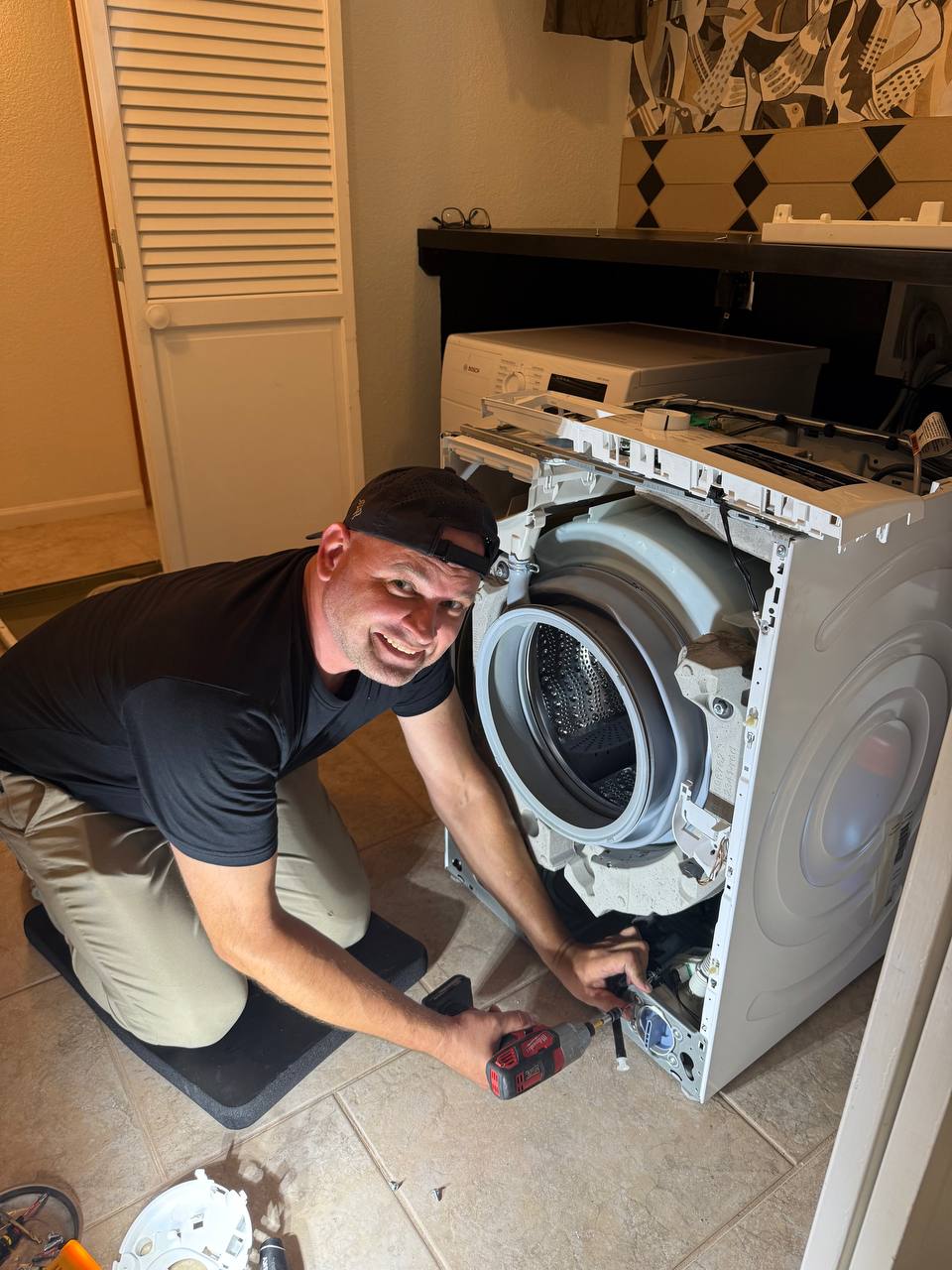 KitchenAid built-in refrigerator repair in progress by Action Appliance in Phoenix AZ