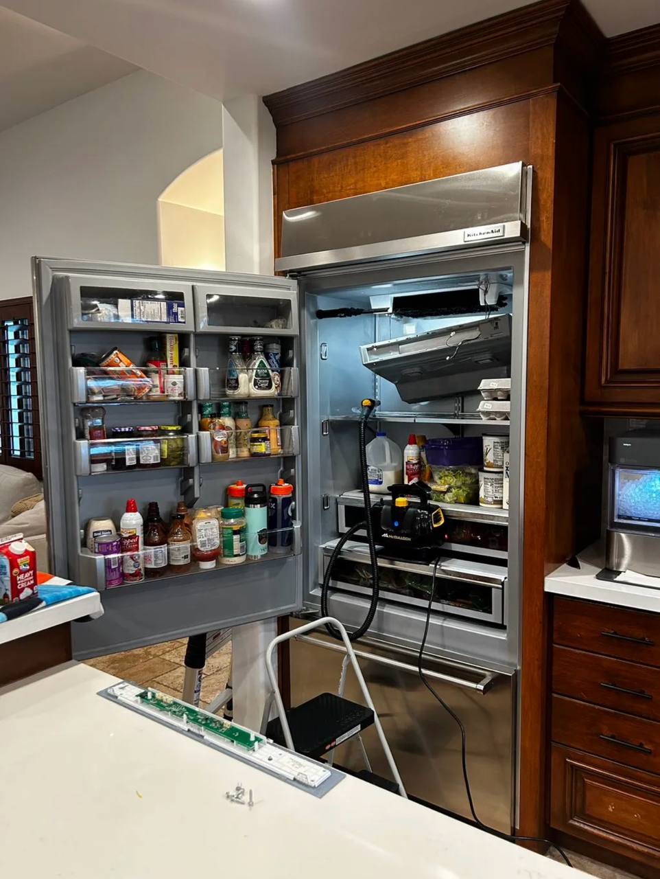 Sub-Zero built-in refrigerator repair by Action Appliance technician in Scottsdale AZ